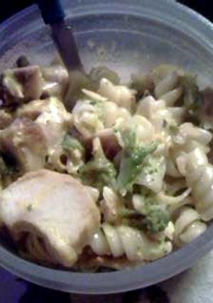 A picture of Velveta broccoli & cheese w chicken & extra broccoli added.