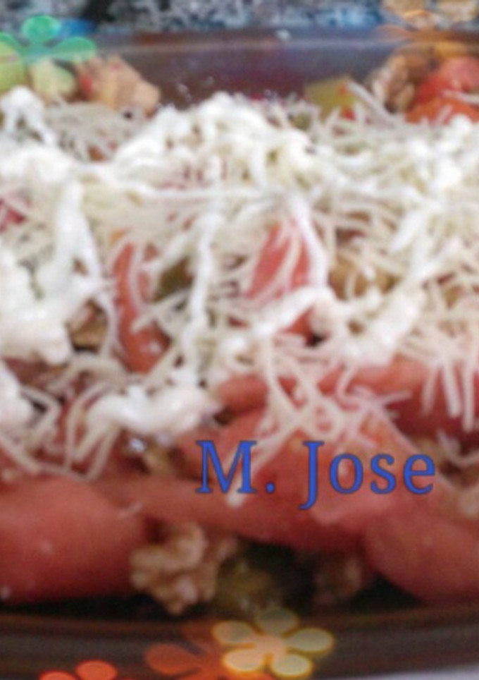Una foto de Ensalada de tomate con nueces