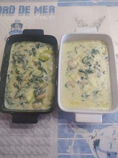 Una foto de Espinacas con bechamel y gambas