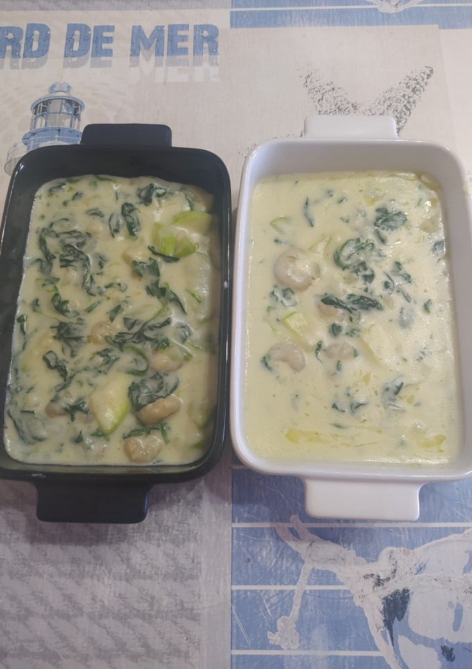 Una foto de Espinacas con bechamel y gambas