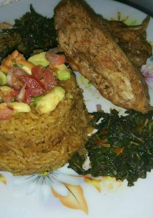 A picture of Pilau,fried chicken with spinach.