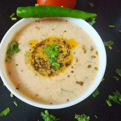 A picture of Tomato tambli (tomato raita).