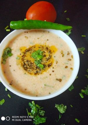 A picture of Tomato tambli (tomato raita).