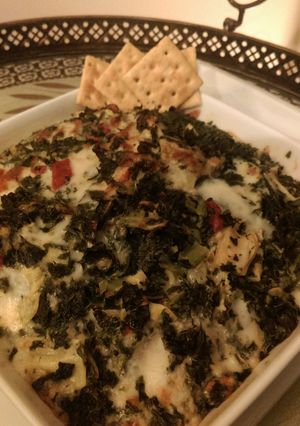 A picture of Spinach , Artichoke And Roasted Red Pepper Dip.