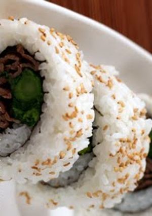 A picture of Broccolini and Beef California Rolls.
