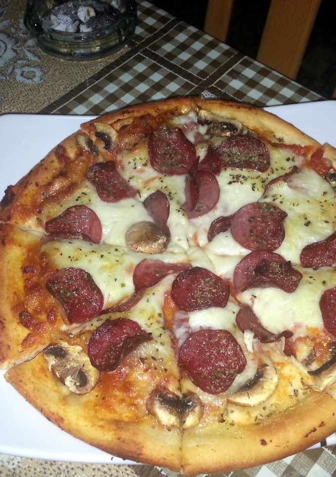 A picture of home made pizza from scratch.