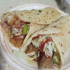 A picture of Chicken zinger wraps in tortilla bread.
