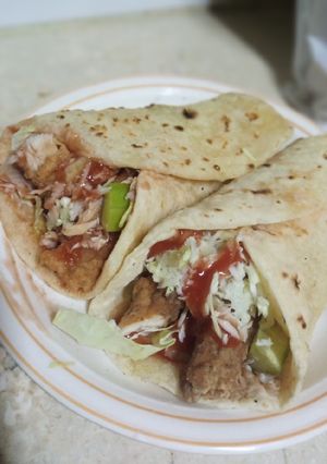 A picture of Chicken zinger wraps in tortilla bread.