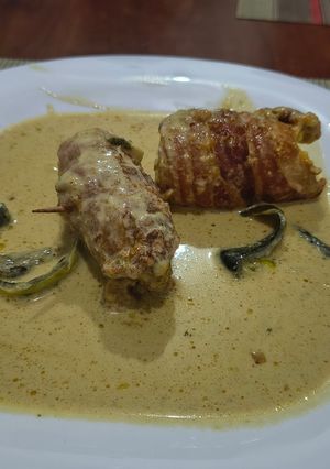 A picture of Chicken Breast Rolls with Cheese and Bacon.