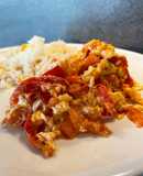 Tomate frito con huevo revuelto