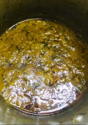 A picture of Tomato mutton curry.