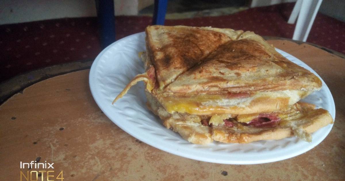 Bread toasted with Egg, Sausage, and Sardine Recipe by Okon Micheal