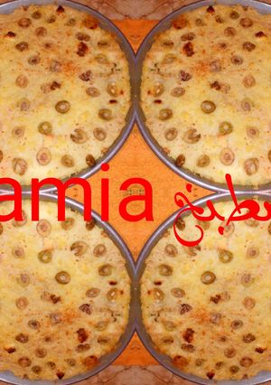 صورة لوصفة بطاطا بيري محشية بالجبن وزيتون في الفرن