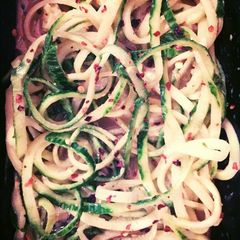A picture of Cucumber Spirals with Spicy Peanut Dressing.