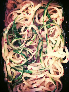 A picture of Cucumber Spirals with Spicy Peanut Dressing.
