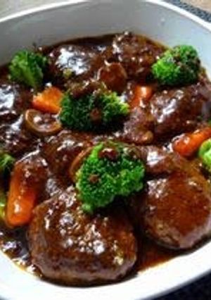 A picture of Delicious Hamburgers Simmered In Demi-glace Sauce.