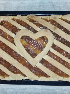 Una foto de Kuchen de durazno