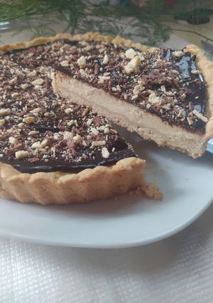Una foto de Tarta De Ricota y Ganache De Chocolate