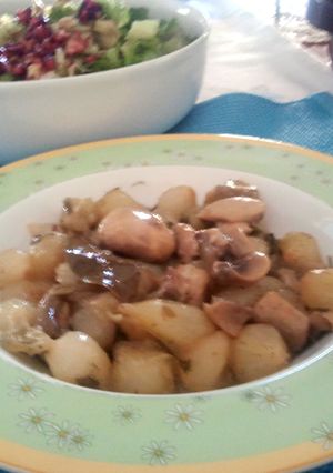 A picture of Mushrooms with Onions.