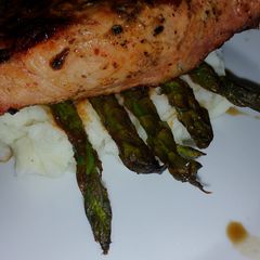A picture of Grilled Honey Balsamic Pork Loin with Smokey Garlic Mashed Potatoes and Chili Dusted Aspargus.