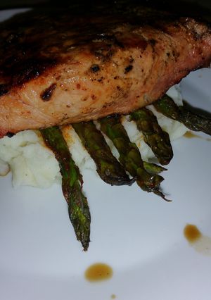 A picture of Grilled Honey Balsamic Pork Loin with Smokey Garlic Mashed Potatoes and Chili Dusted Aspargus.