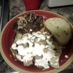 A picture of Steak melts on garlic toast.