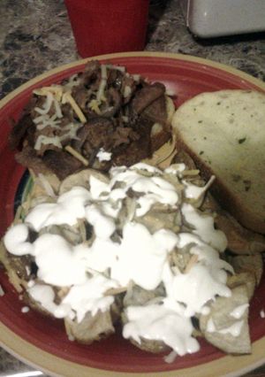 A picture of Steak melts on garlic toast.