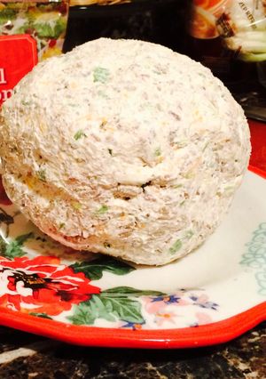 A picture of Cheese Ball Holiday Cheese Planet.
