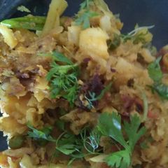A picture of Cabbage Potatoes stir fry (bandhakopir ghonto).