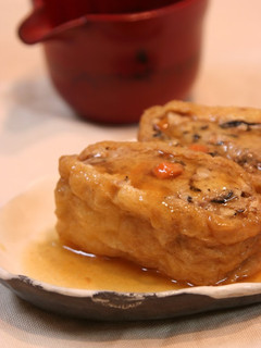 A picture of Soft Simmered Inari With Sauce.