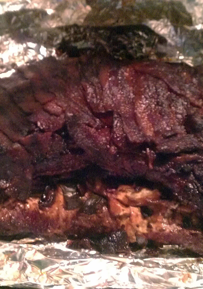A picture of Stuffed Tri-Tip wrapped in Bacon.