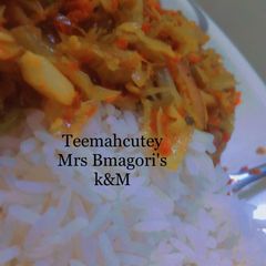 A picture of White rice with veggies.