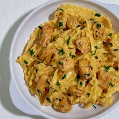 A picture of Mafadine with Chicken in Garlic Parmesan Sauce.