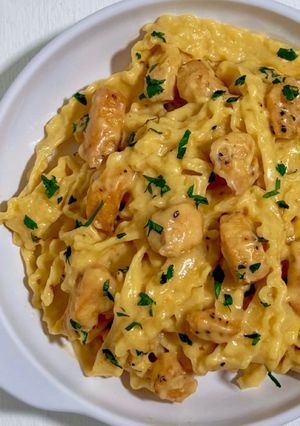 A picture of Mafadine with Chicken in Garlic Parmesan Sauce.