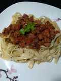 Talharim com Ragu de calabresa com bacon
