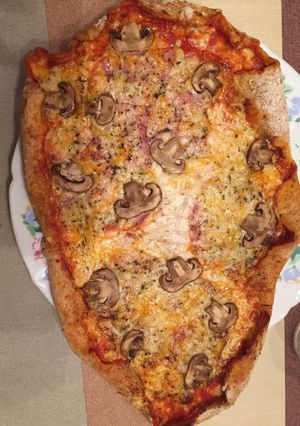 Una foto de Pizza margarita casera