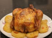Una foto de pollo al horno en achiote