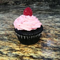A picture of Sinfully Chocolate Cupcakes with Raspberry Buttercream Icing.