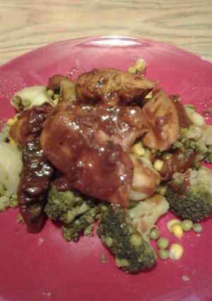 A picture of Chicken and Mushroom on a bed of Sweet Veg.