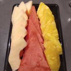 A picture of Pineapple,Water Melon.and Honey Dew.