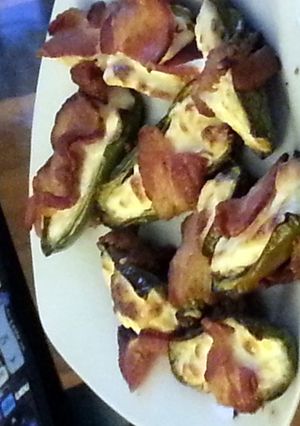A picture of bacon wrapped jalapeno poppers.