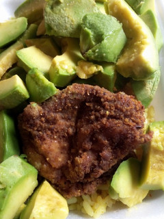A picture of Avacado and crunchy chicken.