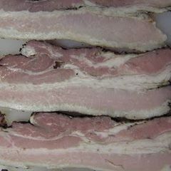 A picture of Homemade Bacon - in the Oven.