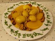 Una foto de chocos con patatas y mejillones