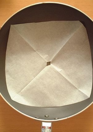 A picture of Easy Otoshibuta Drop Lid with Parchment Paper.