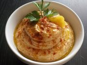 A picture of hummus roasted garlic
