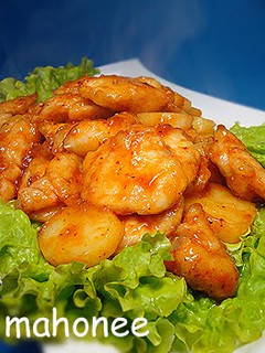 A picture of Chicken Breast and Potatoes with Chili Sauce.