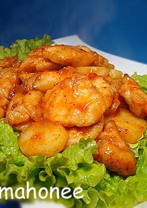 A picture of Chicken Breast and Potatoes with Chili Sauce.