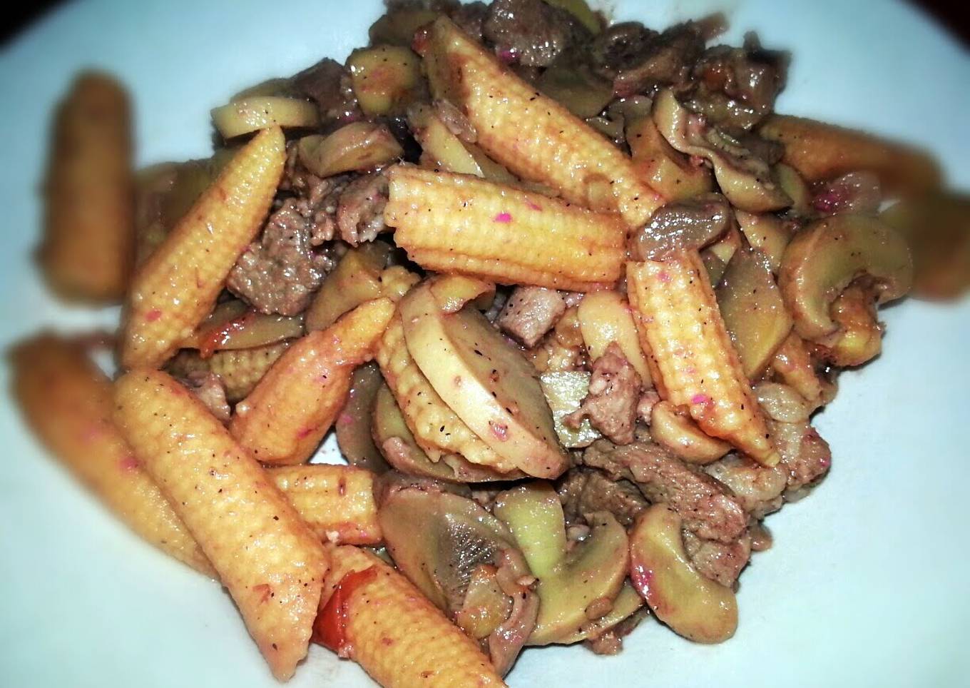 Fresh fried corn with mushrooms