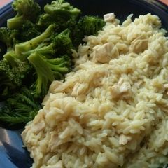 A picture of Chicken and Rice with Broccoli.